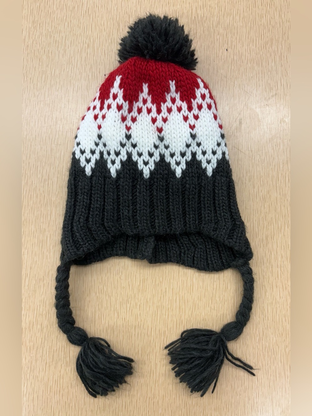 Urban Outiftters pom pom beanie with tassels